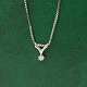 Antik Damgaard-Lauritsen præsenterer: Halskæde i 14 kt. hvidguld med diamant