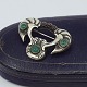 Mogens Ballin; Art Nouveau brooch in silver set with garnets and chrysoprase