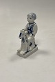 Danam Antik præsenterer: Royal Copenhagen Musselmalet Figur Dreng på Gyngehest No. 5196