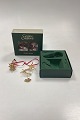 Danam Antik præsenterer: Georg Jensen Golden Christmas Julepynt - Julefryd og Stjerneskud 2002