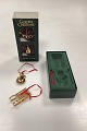 Danam Antik præsenterer: Georg Jensen Golden Christmas Julepynt - Snemand og Kælk 2004