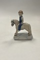 Danam Antik præsenterer: Royal Copenhagen Figur af Pige på Hest No. 5651