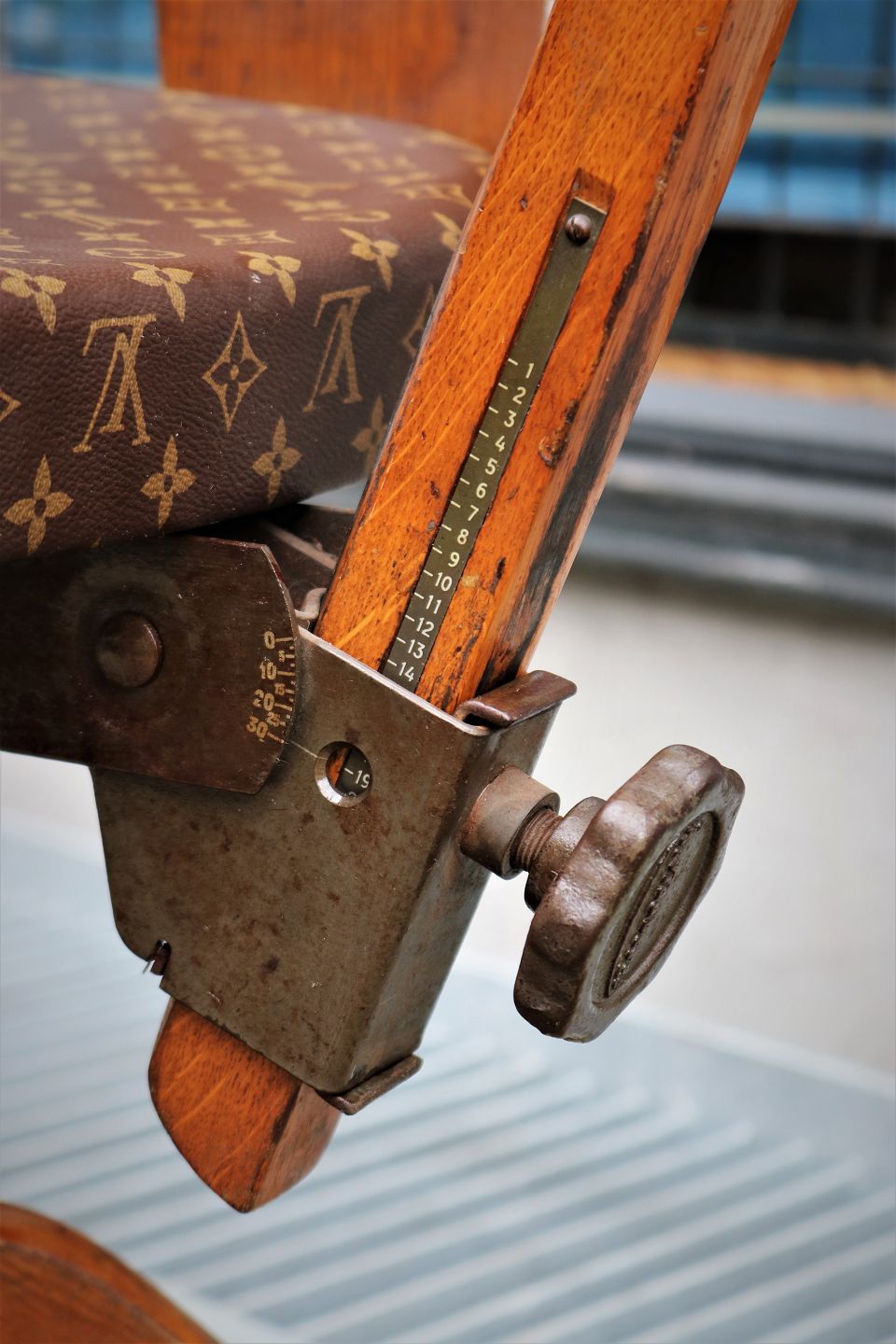 K&Co - Old office chair upholstered with Louis Vuitton monogram logo  canvas