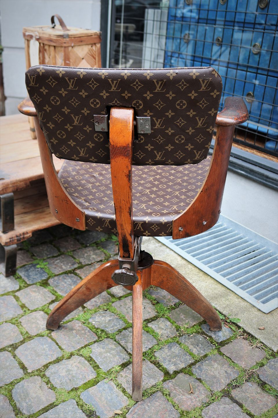 K&Co - Old office chair upholstered with Louis Vuitton monogram logo  canvas