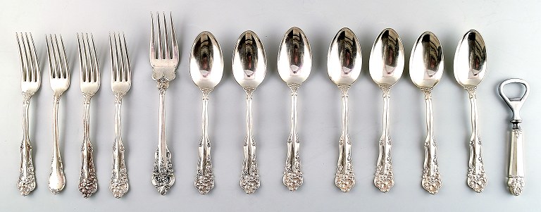 13 pieces American silver, Wallace sterling and W. Rogers, with rich 
ornamentation.