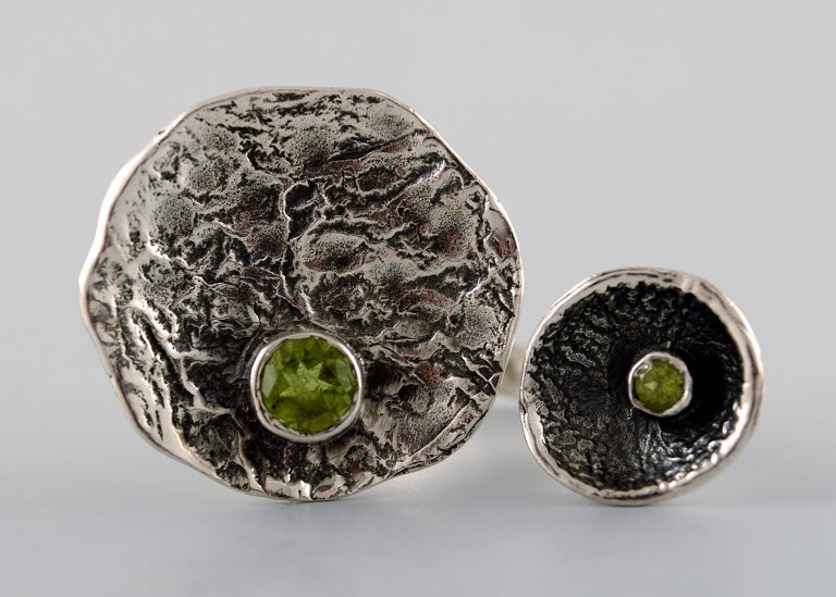 Swedish modernist sterling silver ring with two green stones in organic form.