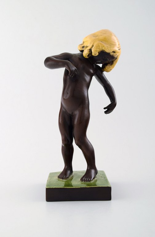 Sjælden og tidlig P. Ipsens Enke pige nr. 888. Venus Kalipygos, Design Kai 
Nielsen. 1928. I brun glasur med gult hår.