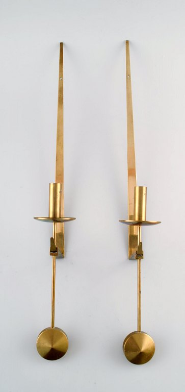 A pair of Skultuna, Sweden, brass candlesticks. Model 1607.