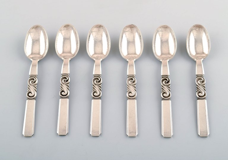 Georg Jensen. Cutlery, Scroll no. 22, hammered Sterling Silver consisting of: 6 
coffee spoons.