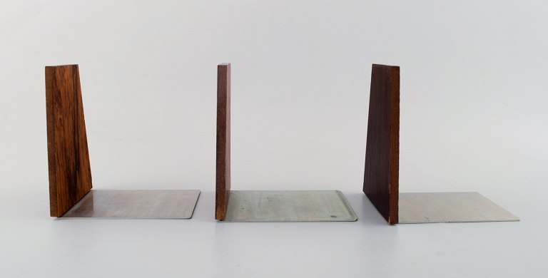 Danish design: Three stylish bookstands in teak and stainless steel.