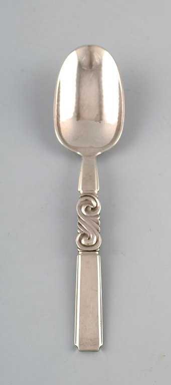 Georg Jensen. Cutlery, Scroll no. 22, hammered Sterling Silver. Dinner spoon.