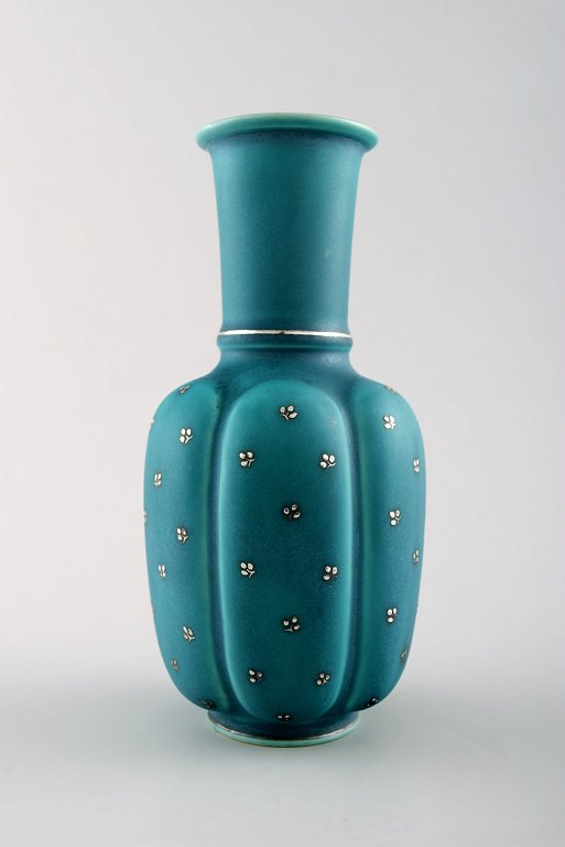 Wilhelm Kåge/Kaage, Gustavsberg, Argenta art deco vase decorated with leaves. 
Rare shape.
