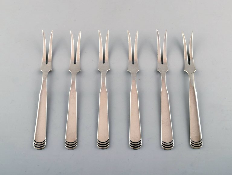 Hans Hansen silverware number 15. A set of six cold meat forks in silver (830). 
1930/40