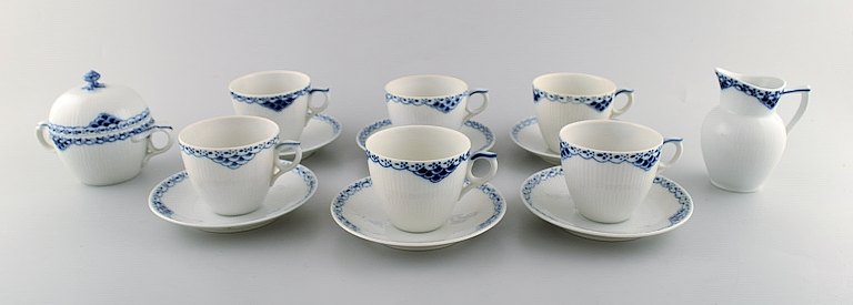 Royal Copenhagen blue painted Princess. Set of six coffee cup with saucers along 
with creamer and sugar bowl in porcelain. 
Model Number 756.