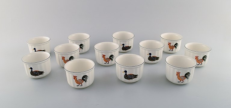 Villeroy & Boch Naif dinner service in porcelain. A set of 12 small oven proof 
bowls decorated with naivist animal motifs.