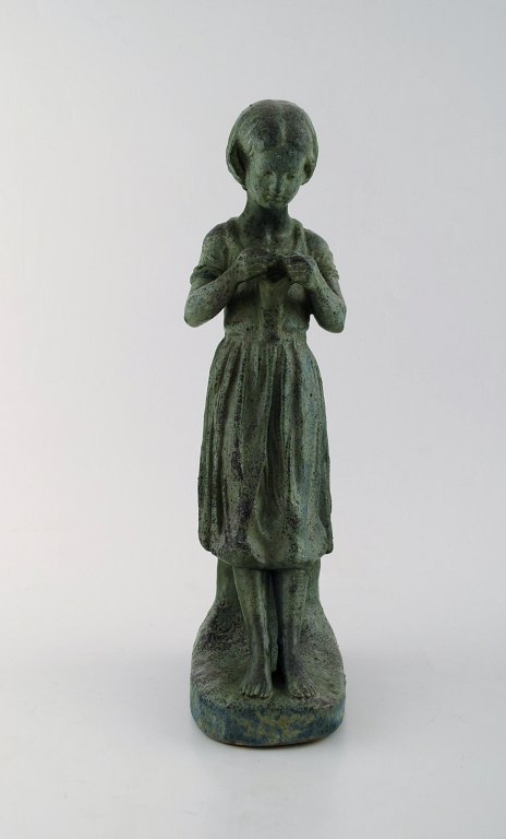 Camille Claudel (b. 1864, d. 1943), French sculptor. Large sculpture in green 
glazed ceramic / stoneware. Young girl standing.