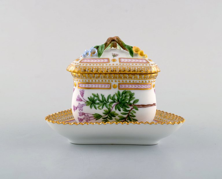 Royal Copenhagen Flora Danica triangular cream cup. Dessin # 20/3575 with branch 
shaped handle and flowers.