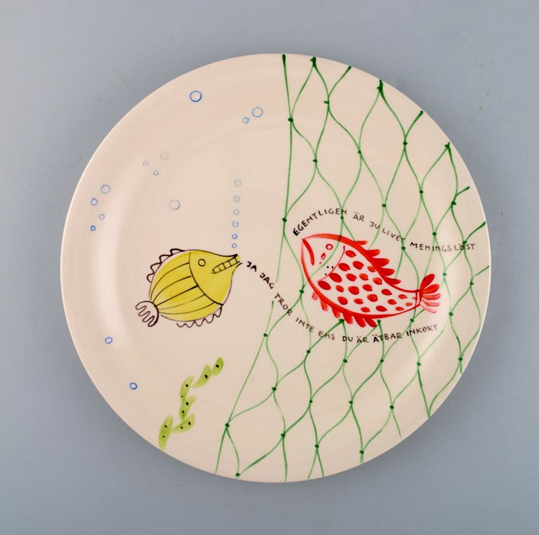 Stig Lindberg for Gustavsberg. "Löja" plate. Hand painted with fish motifs. 
1950
