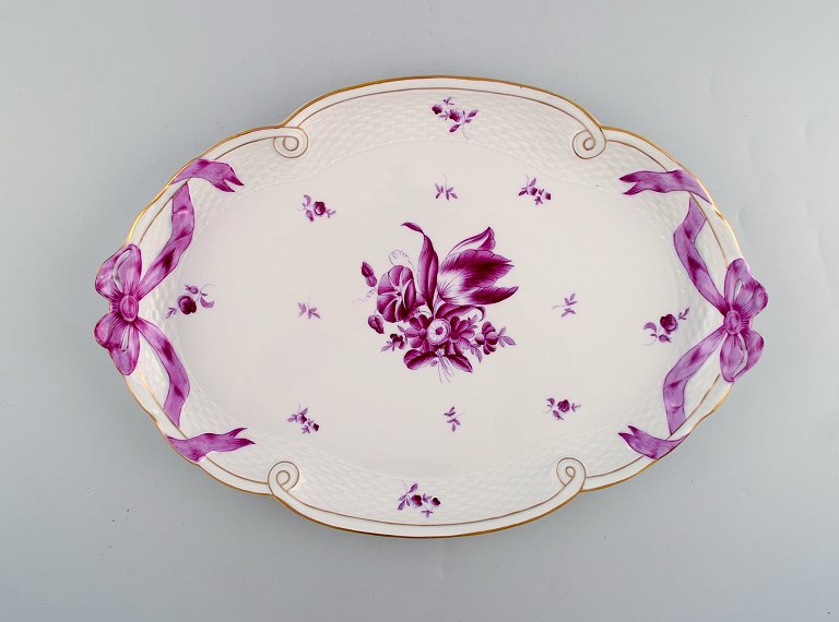 Large Herend serving tray in hand painted porcelain. Purple flowers and ribbons 
with gold decoration. Mid 20th century.
