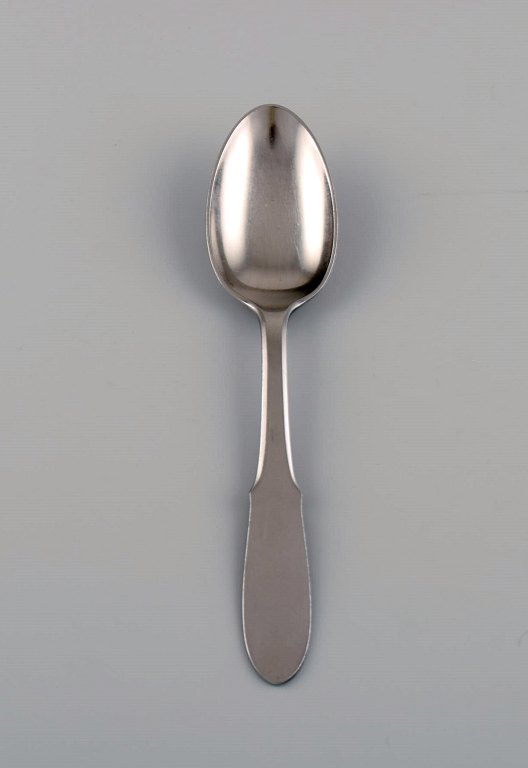 Gundorph Albertus for Georg Jensen. Mitra stainless steel dessert spoon. 1970s. 
Twelve pieces in stock.
