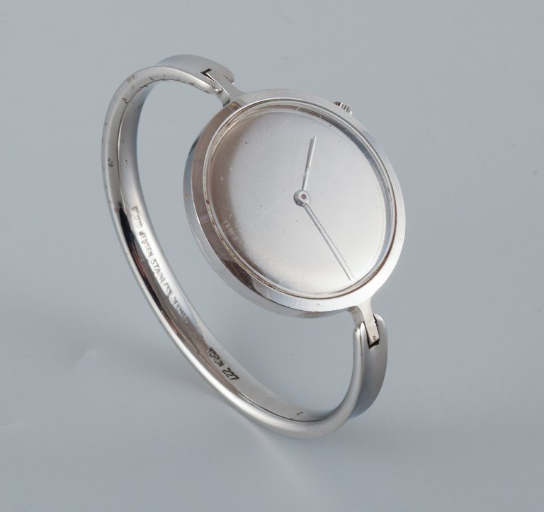 Vivianna Torun Bülow-Hübe, steel wristwatch.Design 227. Mechanical movement with manual winding.Silver colored dial with steel hands.