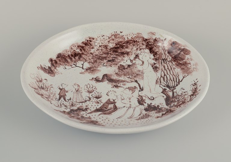 Bjørn Wiinblad, large, early unique hand-painted dish decorated with romantic 
scenery in a park.