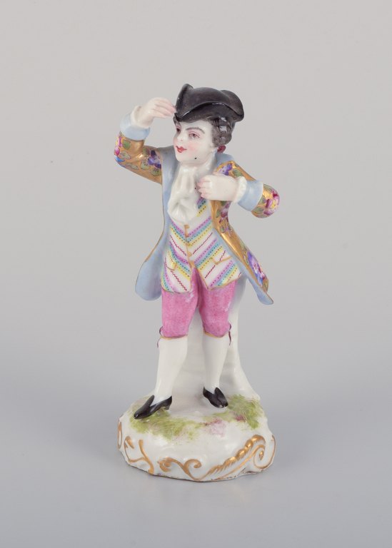 Meissen, Tyskland, tysk porcelænsfigur af ung mand i fine klæder. Håndmalet i 
polykrome farver.