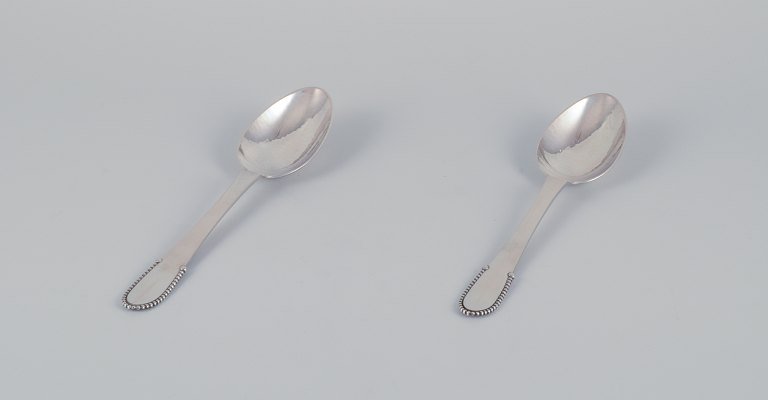 Georg Jensen. Two Beaded tablespoons in 830 silver.