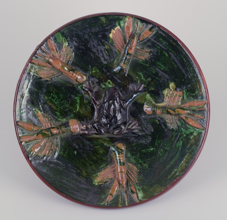 Swedish ceramist for Elfstrands Kärlfabrik, Sjöbo.
Unique ceramic dish.