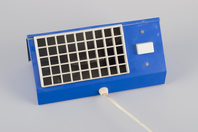 Hans-Agne Jakobsson, Sweden.
"Elidus" bedside lamp in blue-lacquered metal.