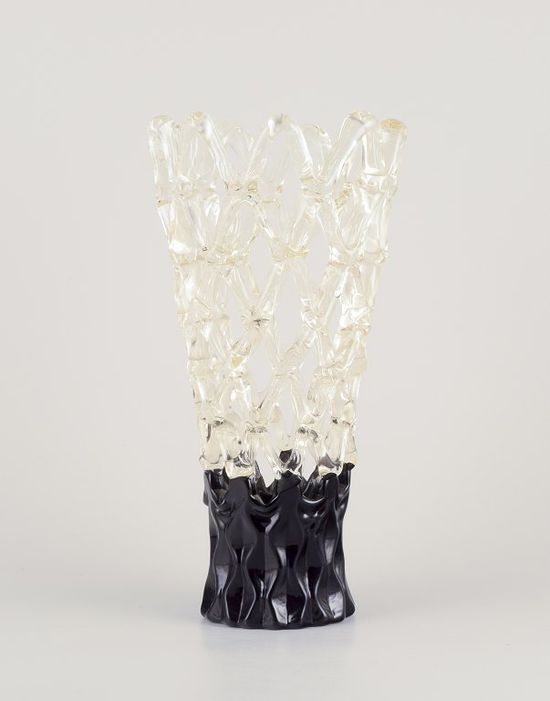 Murano, Italy.
Exclusive Murano art glass vase with a refined lattice design.
