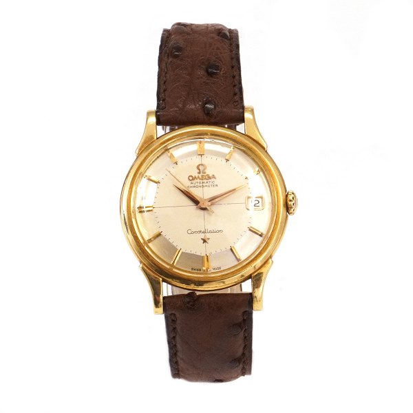 Omega Constellation Pie Pan i 18kt guld med box og certifikat ref. 14382 82SC 
solgt 01.06 1961. Kaliber 561. D: 34mm