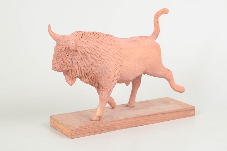 Nils-Erik Zetterström, tyre figur på træbase.