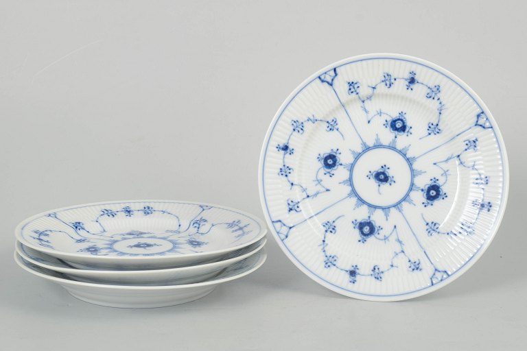 Royal Copenhagen Musselmalet Riflet, sæt af fire tallerkener.