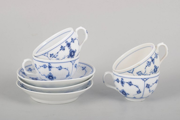 Royal Copenhagen Musselmalet Riflet, sæt med fire kaffekopper med underkopper.