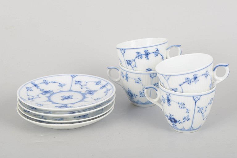 Royal Copenhagen Blue Fluted Plain, set of four coffee cups with matching saucers.